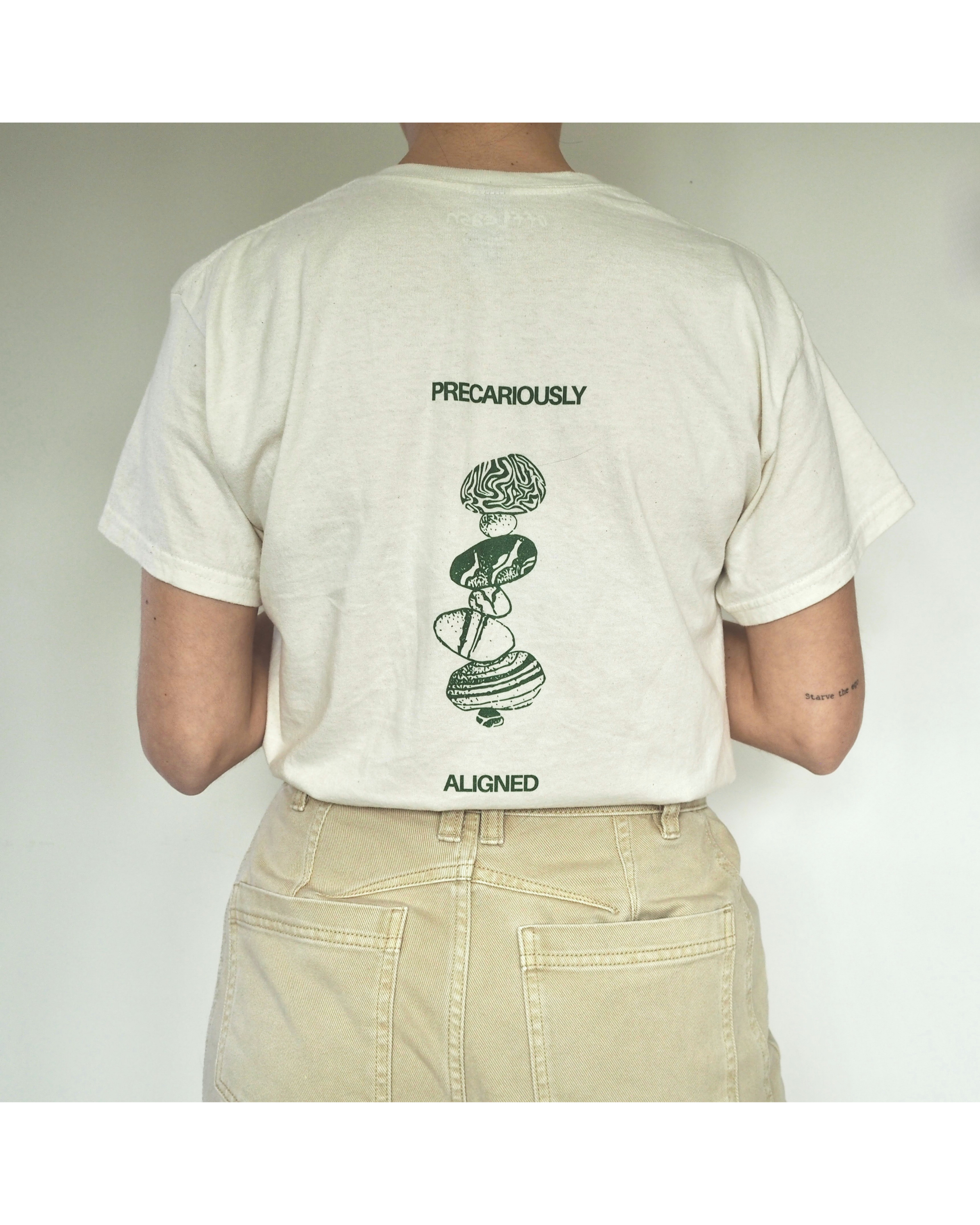 'Precariously Aligned' unisex cotton tee