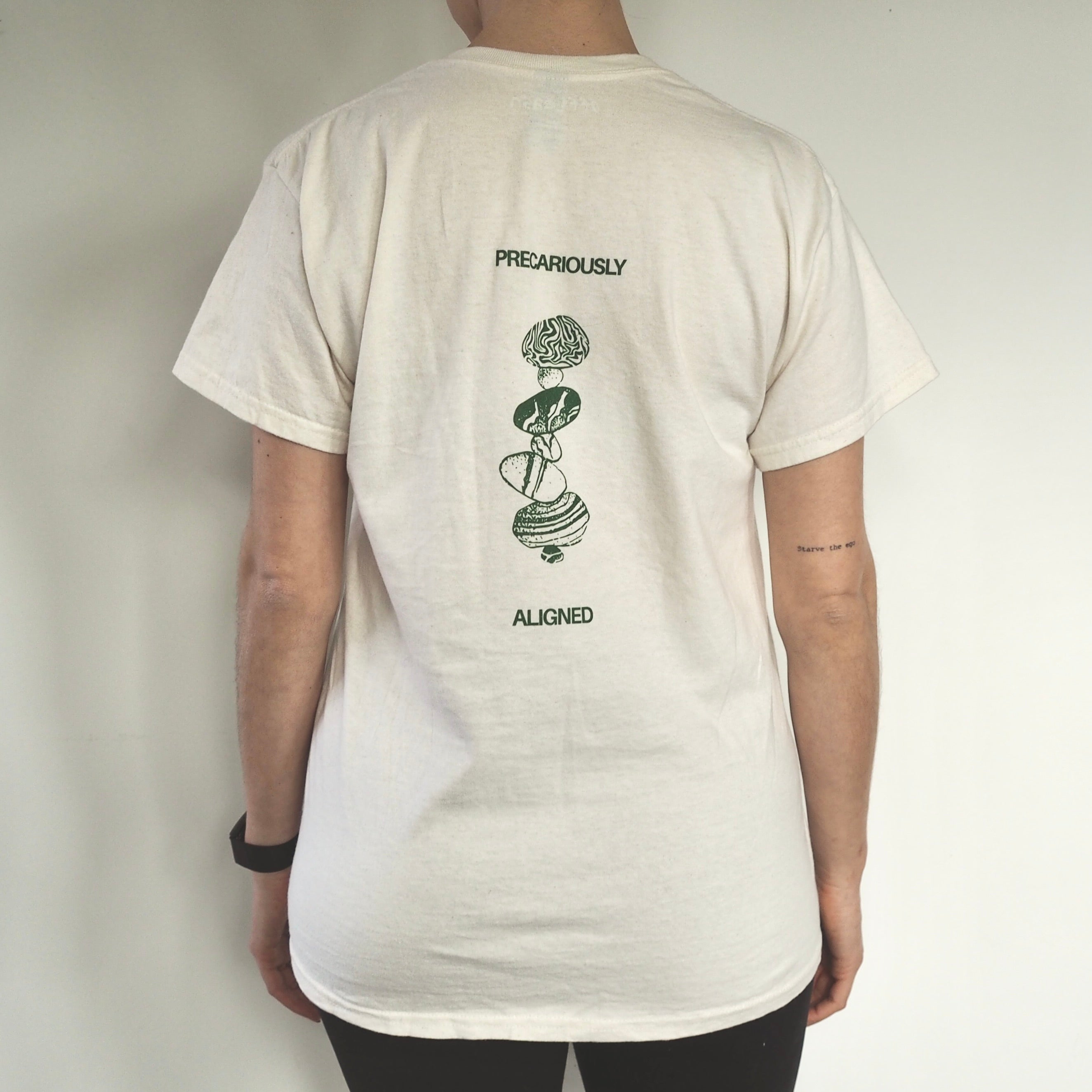 'Precariously Aligned' unisex cotton tee